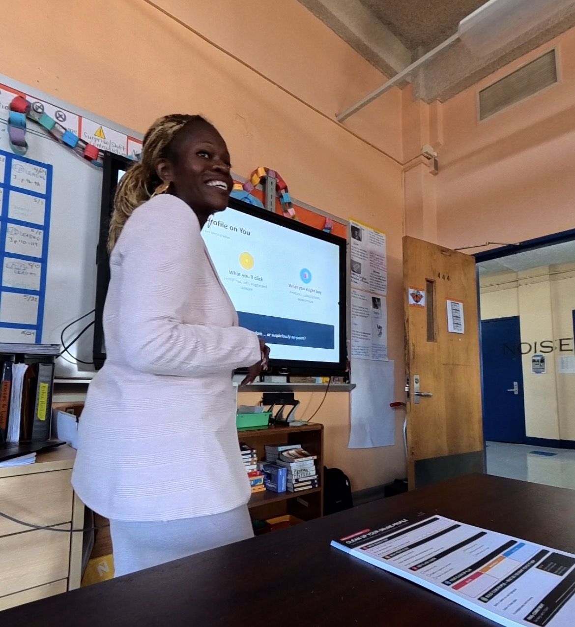 Schnelle Acevedo teaching a digital literacy session in a NYC classroom